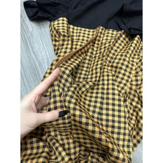 Đầm kẻ tà lệch hàng thiết kế