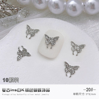Charm bướm nơ kim loại bạc