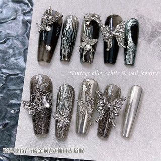 Charm bướm nơ kim loại bạc