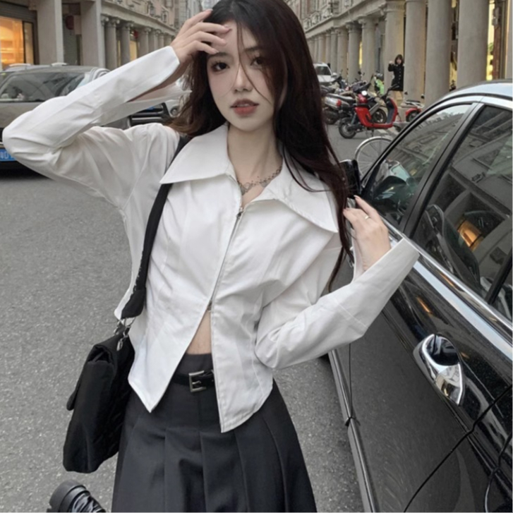 Áo sơ mi nữ trắng khóa kéo vạt xẻ tà đuôi tôm basic cá tính form vừa phong cách hàn quốc hottrend DELIZ