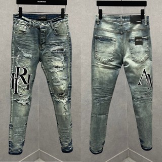 Quần jean bò nam Amiri skinny wash xanh bụi rách trần chỉ thêu chữ da đùi 4 cúc chữ dáng boy phố QJ467P