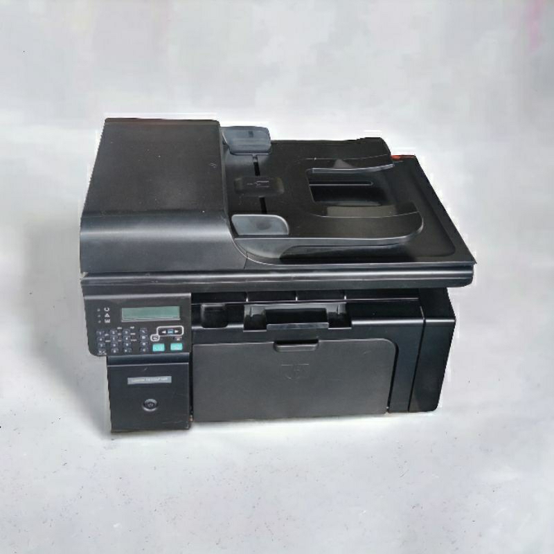 Máy in đa năng HP1212nf in,photo, scan, mạng lan + hộp mực mới 100%