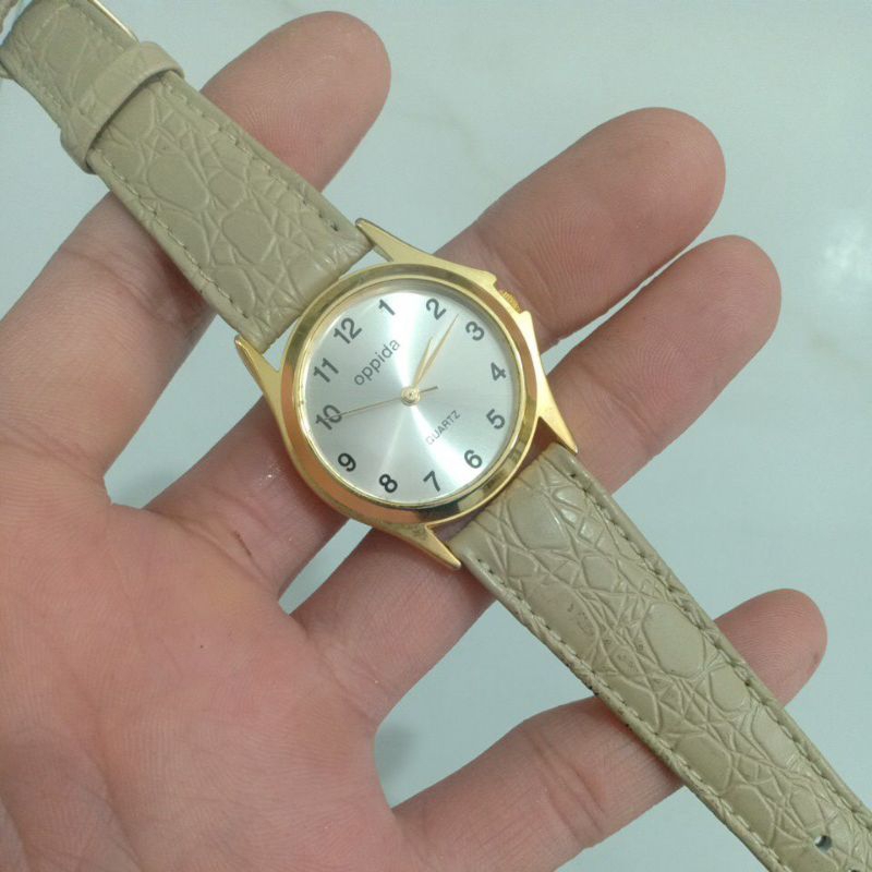đồng hồ si nam nữ dây da hiệu OPPODA si vàng độ mới cao 95% phù hợp nam tay nhỏ với nữ tay to