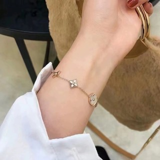  Lắc tay titan hoa xà cừ Lệ vi 