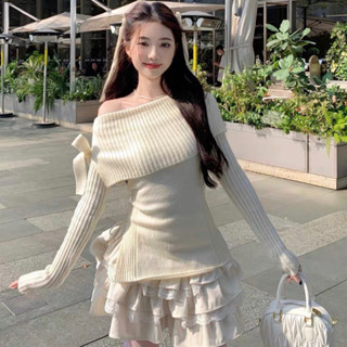 Áo Trễ Vai Len Gân Thắt Nơ Lệch Via Trắng Sữa Ôm Tôn Dáng Phong Cách Nữ Tính Hàn Quốc