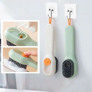 Bàn chải vệ sinh giày đa năng có ngăn đựng xà phòng.