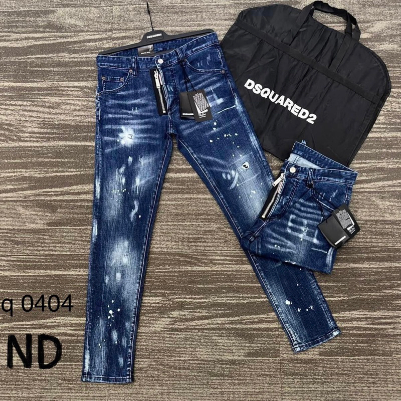 Quần jean bò nam Dsq2 biker slimfit khoá lệch wash xanh bạc rách vảy sơn trắng phong cách boy phố Hottrend 2024
