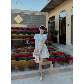 Đầm gấm xanh nơ xanh