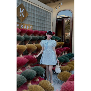 Đầm gấm xanh nơ xanh
