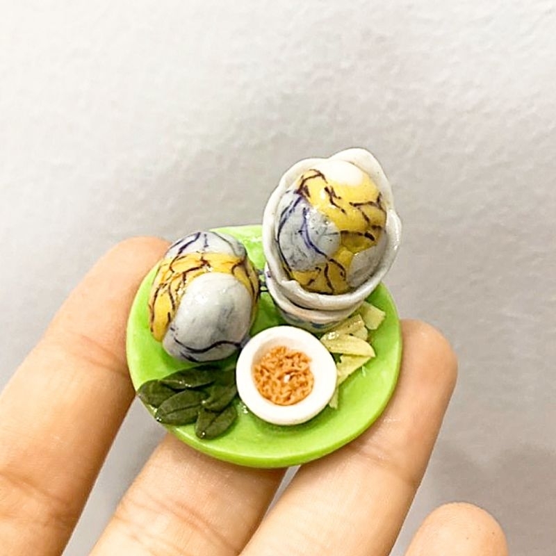 Mô hình, móc khoá đĩa trứng vịt lộn