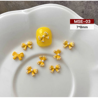 CHARM NƠ VÀNG SET 12 VIÊN M704