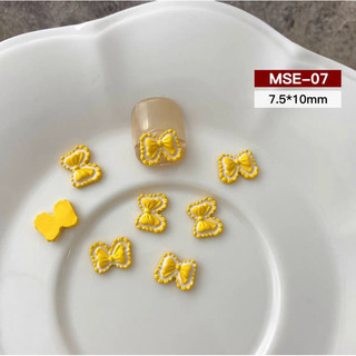 CHARM NƠ VÀNG SET 12 VIÊN M704