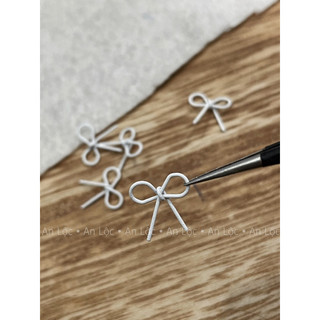 charm nơ thắt xinh xắn