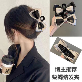 Kẹp nơ đen trắng đính chữ min phong cách Hàn