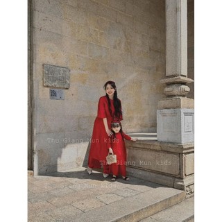 Áo dài gấm bé gái
