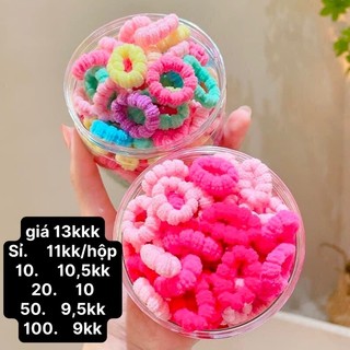 Hộp 100 dây cột tóc trơn hình bông