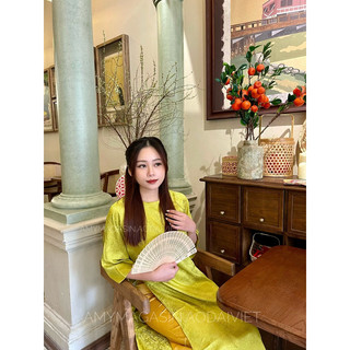 Áo dài gấm Liên Hoa xanh bơ