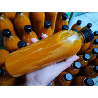 500ml cốt nghệ hạt gấc Tuệ Linh thoa mặt sau sinh