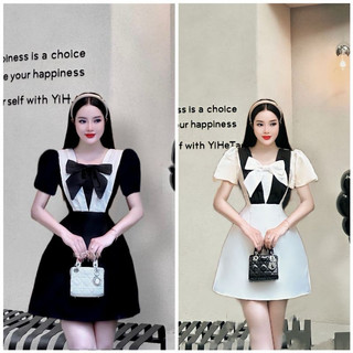 ĐẦM ĐEN CỔ V XẾP ĐÍNH NƠ NGỰC TAY NGẮN
