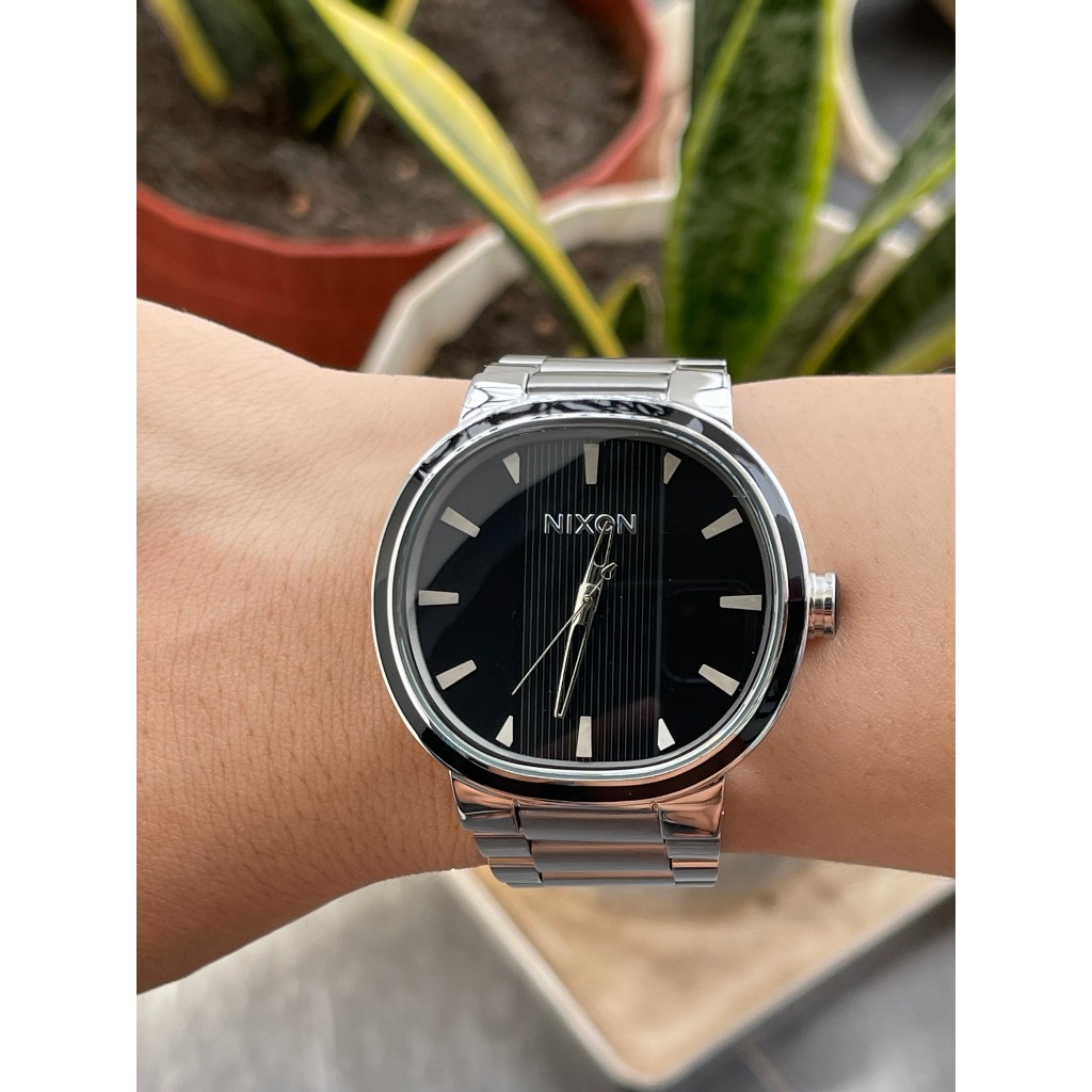 Đồng hồ nam Nixon mặt sọc chạy pin hàng Nhật