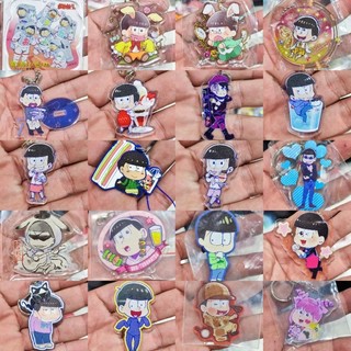 Móc khóa + huy hiệu nhân vật anime.