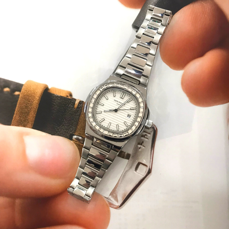 Đồng hồ nam Patek Philippe Nautilus 57131G-010 mặt kính Mineral viền đinh đá chống nước dây thép đeo tay cao cấp