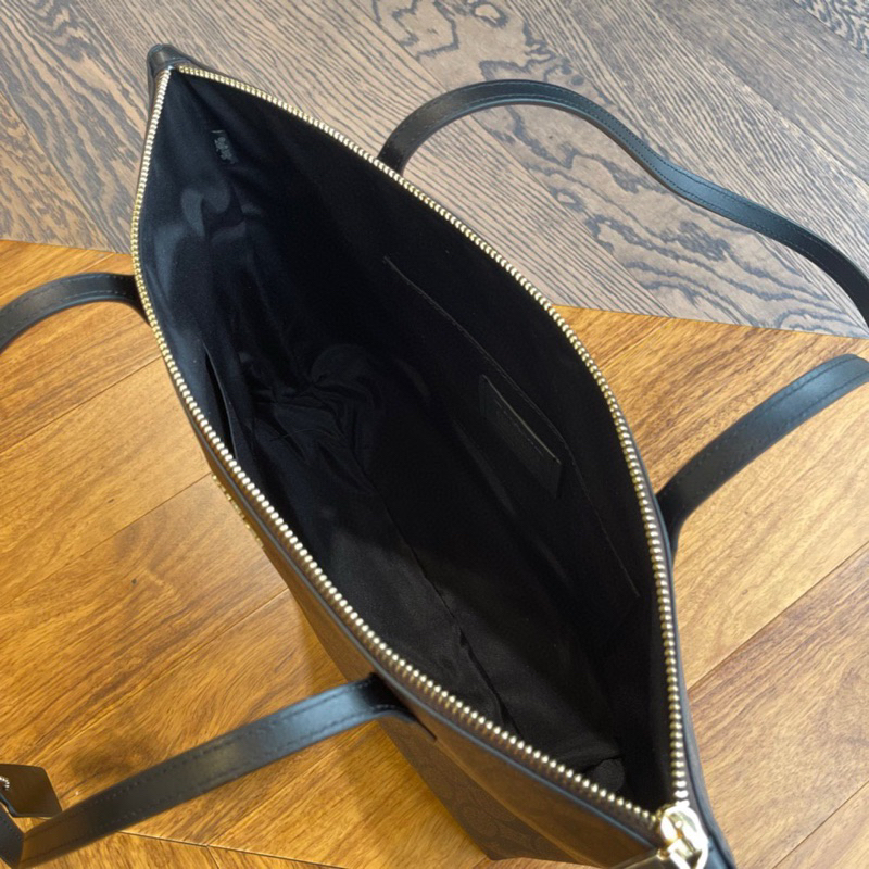 Túi coach zip top tote nữ