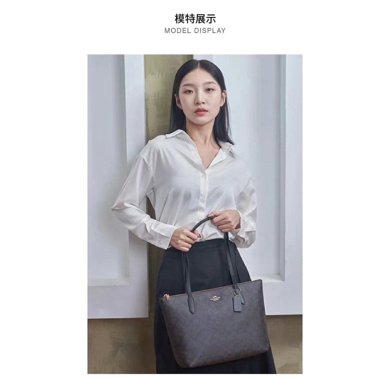 Túi coach zip top tote nữ