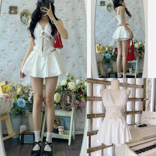 Đầm trắng cổ tim đan dây eo tay bồng viền bèo