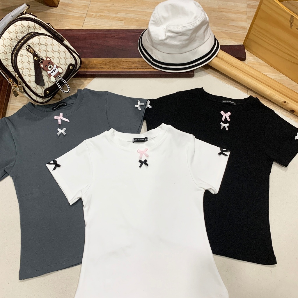 Áo thun đính nơ BUN222 form ôm body cho nữ, baby tee đủ màu chất cotton co giãn thoải mái | BigBuy360 - bigbuy360.vn