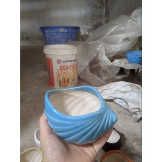 Chậu sứ hình Ốc