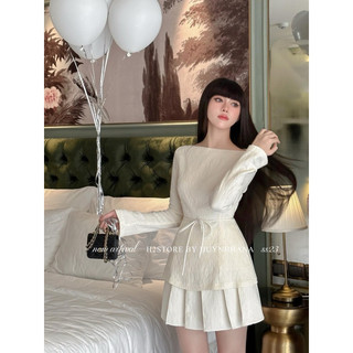Set áo cổ thuyền tay dài thắt dây nơ eo + chân váy xòe xếp ly nude