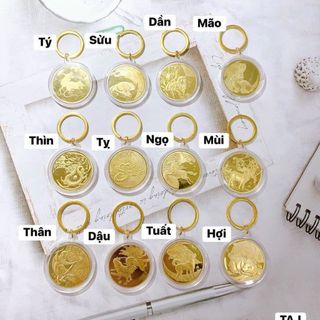 Móc khóa đồng xu khắc 12 con giáp phong thủy may mắn.