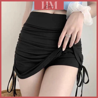 Chân váy đen ngắn kèm quần trong có dây rút 2 bên ôm body cực xinh