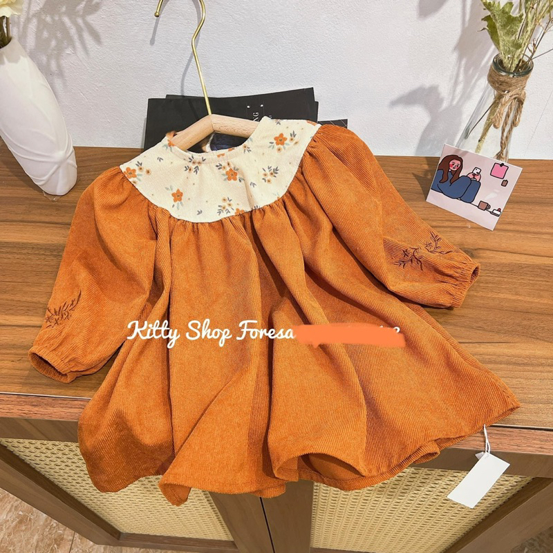 Đầm thiết kế nhung tăm cho bé xả lỗ nghỉ bán