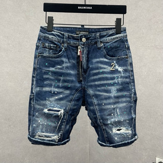 Quần short bò ngố nam DSQ xanh đậm wash loang rách xước vảy sơn thêu khoá lệch tag số 2 đùi QS140P