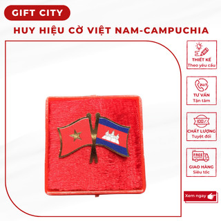 Huy hiệu cài áo lá cờ Việt Nam - Campuchia inox vàng gương