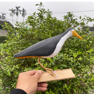 chim quốc mồi giả