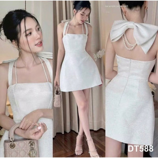 Đầm xoè chất dạ vân đá phối nơ và chuỗi ngọc xinh xắn