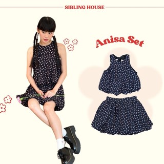 Set áo yếm bí thiết kế cột nơ đằng sau và chân váy bí họa tiết hoa nhí Anisa Set - Sibling House