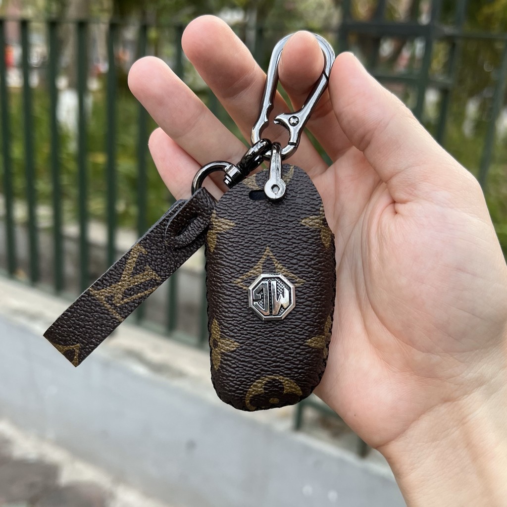 Bao da chìa khóa smartkey xe ô tô MG ZS MG HS MG5 2022 mẫu mới khâu tay móc đen MG