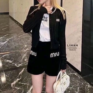 Quần shorts phối túi hộp Miumiu Lưng cao_ UN