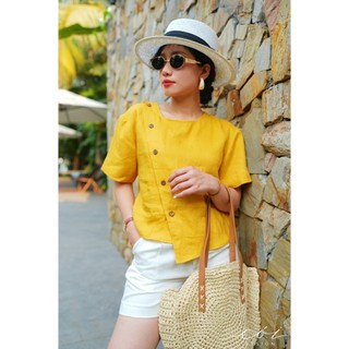 Áo linen hàng nút dừa cói design