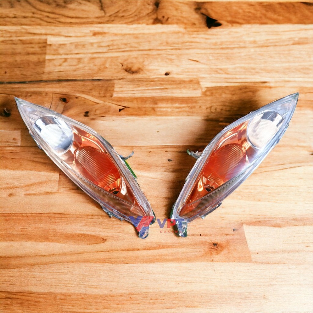 Đế chụp xi nhan trước Yamaha EX135 - 2010 chính hãng Appi