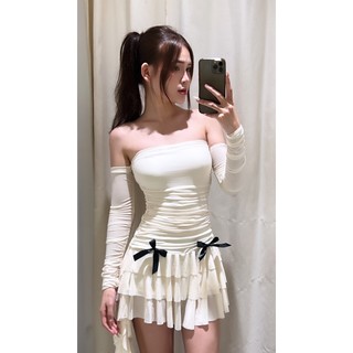 Váy thun nhúng đính nơ tua rua titi dres