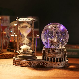 Đồng hồ cát quả cầu pha lê phát sáng mô hình tháp retro phát sáng có hộp nhạc, quà lưu niệm, quà sinh nhật