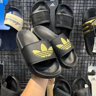 Dép Quai Ngang Chính Hãng Adidas Adilette Lite Slides Đen Logo Vàng Shop Xám Store