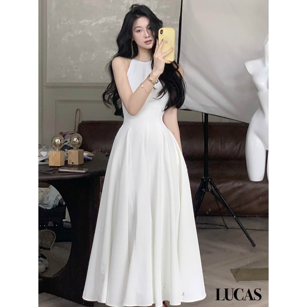 Váy khuyết tay dáng a dài basic