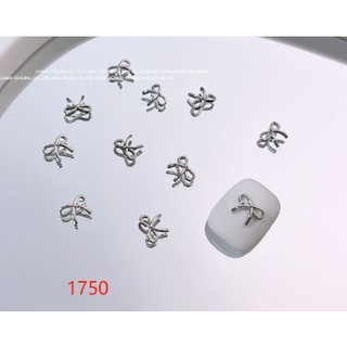 Lẻ cái mã charm nơ màu bạc nhé a