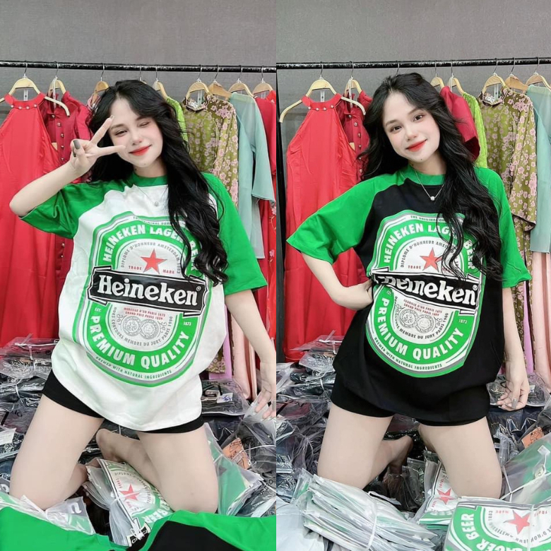 Áo thun nữ bia Heineken phom rộng dấu quần y mẫu mặc cổ tròn tay ngắn raglan. Áo thun khô phom siêu to phối tay raglan